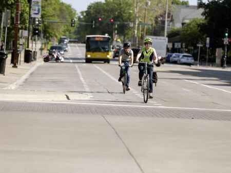 Iowa City reminding drivers not to block bike lanes