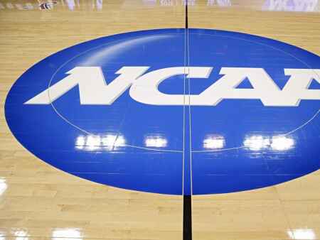NCAA clears way for athletes to cash in on NIL