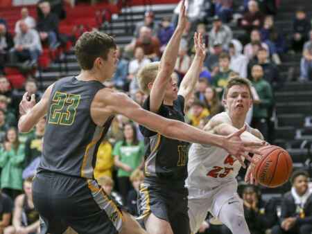 Photos: High school boys’ basketball—Linn-Mar vs. Cedar Rapids Kennedy