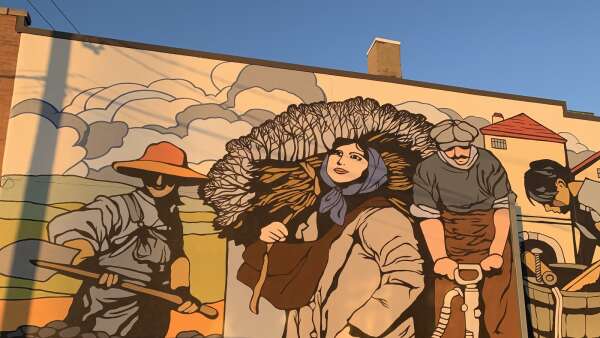 NewBo mural pays ‘Homage to Immigrants’ who shaped Cedar Rapids