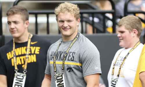 Iowa football recruit a star in wrestling and basketball, too