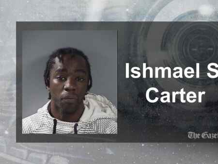 IC man set fire at door, trapping woman, police say