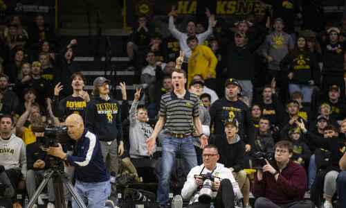 Iowa sets record and continues to lead college wrestling in attendance