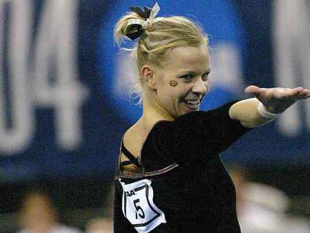 50 moments since Title IX: Gymnast named All-American thrice