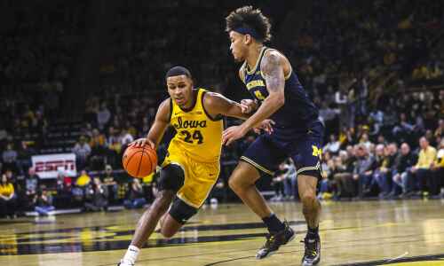 Hawkeyes knock off Michigan in overtime, 93-84