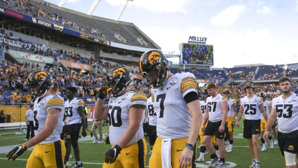 Pilot, crew shortages nix chartered flight to bowl game for Hawkeye fans