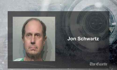 Movie-watching driver who struck Iowa police officer sentenced