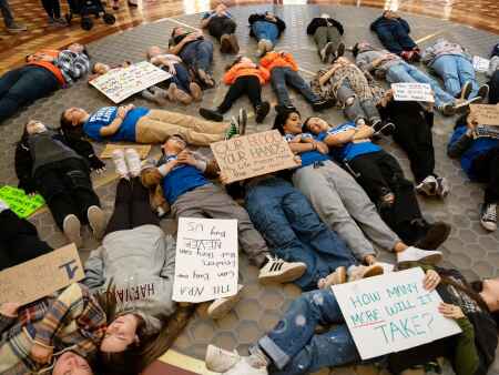 Iowa students protest bill allowing guns in school, college parking lots
