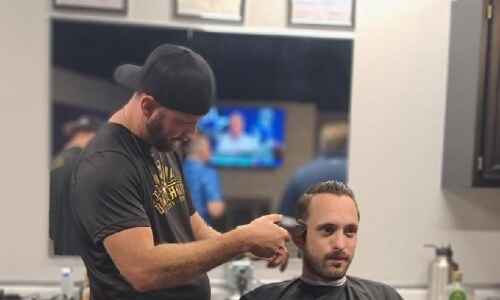 Former Iowa prison barber now owns his own shop