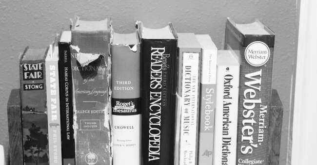 A bookshelf buried by time