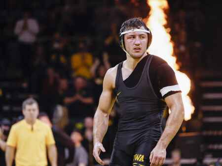 Iowa honors 8 senior wrestlers in home finale against Wisconsin