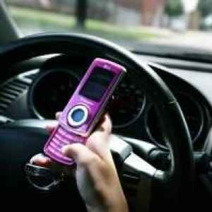 Lawmakers again weigh ban on hand-held phones while driving
