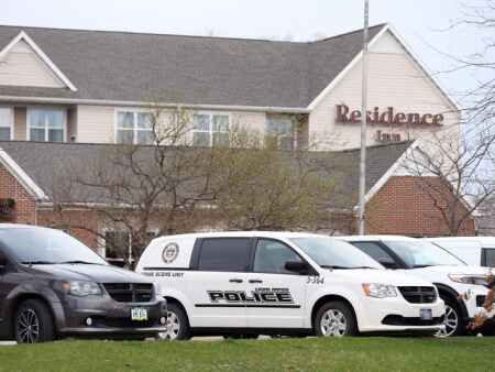 Two men arrested after fatal stabbing in Cedar Rapids hotel room