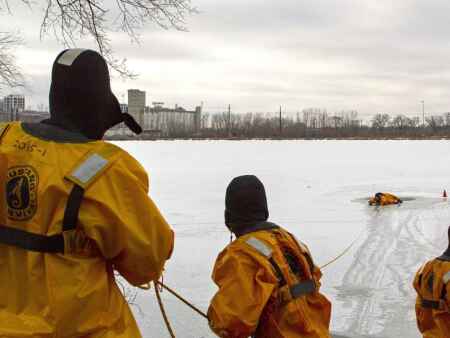 Gazette reporter plunges into frozen lake to learn ice water rescues with CRFD