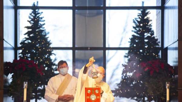 Photos: Christmas morning mass at St. Ludmila Catholic Church