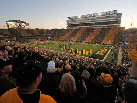 Iowa pauses season ticket sales on a day the Hawkeyes report 9 COVID-19 cases
