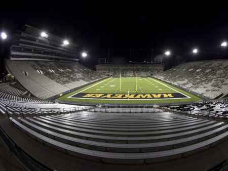 Iowa athletics shuts down after surge in COVID-19 cases