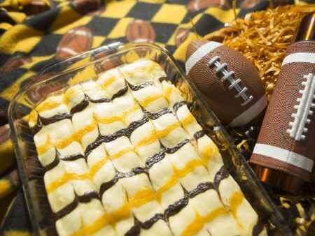Share your Iowa Hawkeye spirit with these gold and black cheesecake bars