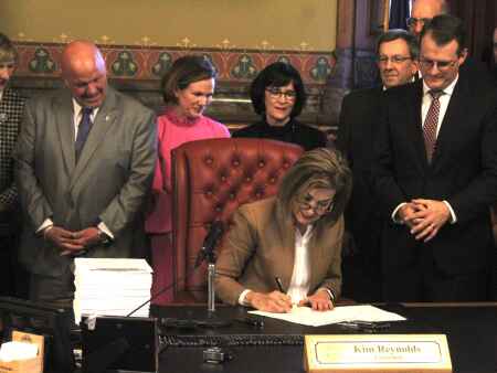 Iowa state government set for reorganization after Reynolds signs her proposal into law
