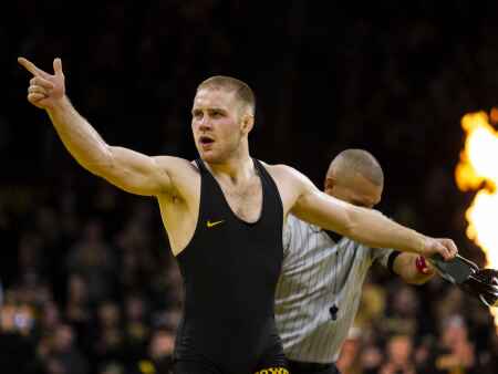 Iowa shares lead after opening session at Big Ten Championships
