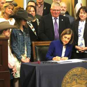 Reynolds signs law boosting oversight of foreign ownership of Iowa farmland