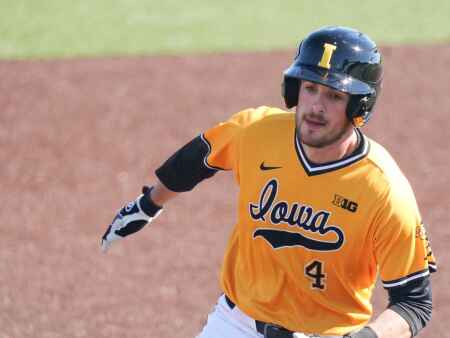 Another grand slam lifts Hawkeyes in Big Ten tournament opener