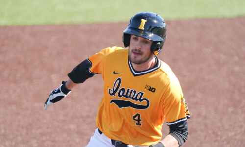 Another grand slam lifts Hawkeyes in Big Ten tournament opener