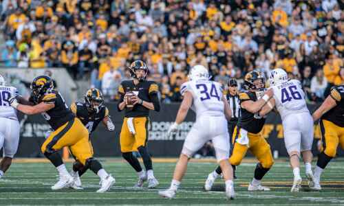 Iowa sticks with QB status quo, tinkers with offensive line