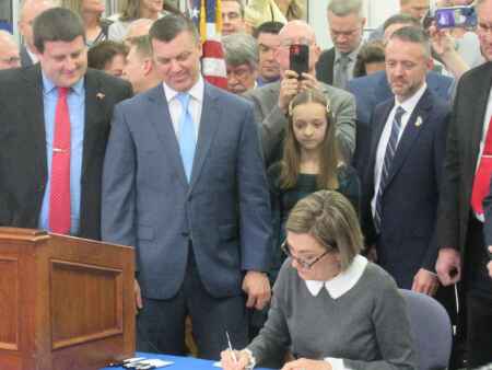 Iowa Gov. Reynolds signs into law $1.9B in tax cuts