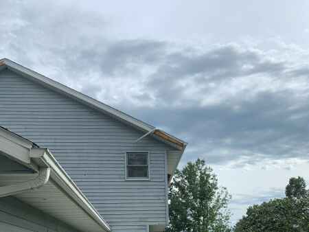 Who’s to blame for missing $22K for derecho roof repairs?
