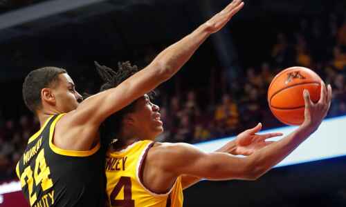 Defense and rebounding carry Hawkeyes past Minnesota