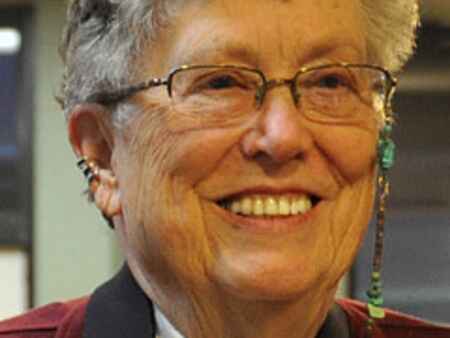 Iowa photographer known for chronicling women’s lives dies