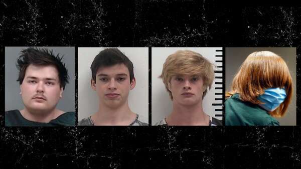 4 young Iowans await trial for slayings of families, teacher