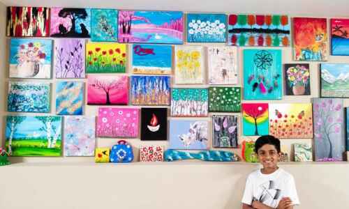 Dubuque boy raises thousands for charity by selling paintings