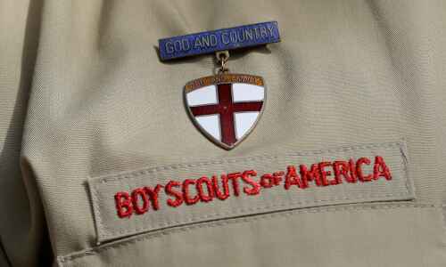 Iowa governor signs bill to help Boy Scouts abuse victims