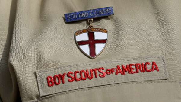 Iowa governor signs bill to help Boy Scouts abuse victims